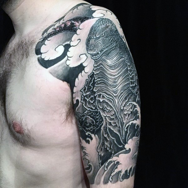 手臂亚洲风格的黑白哥斯拉纹身图案