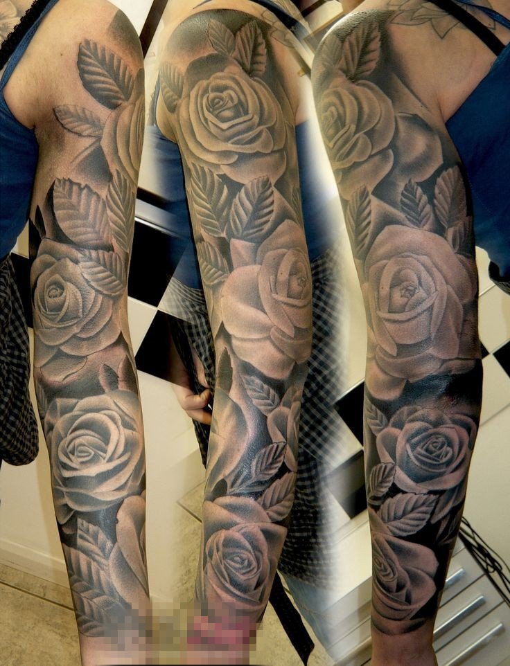 女生手臂上黑色素描点刺技巧唯美花朵花臂纹身图片